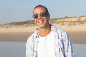 Model smiling on the beach